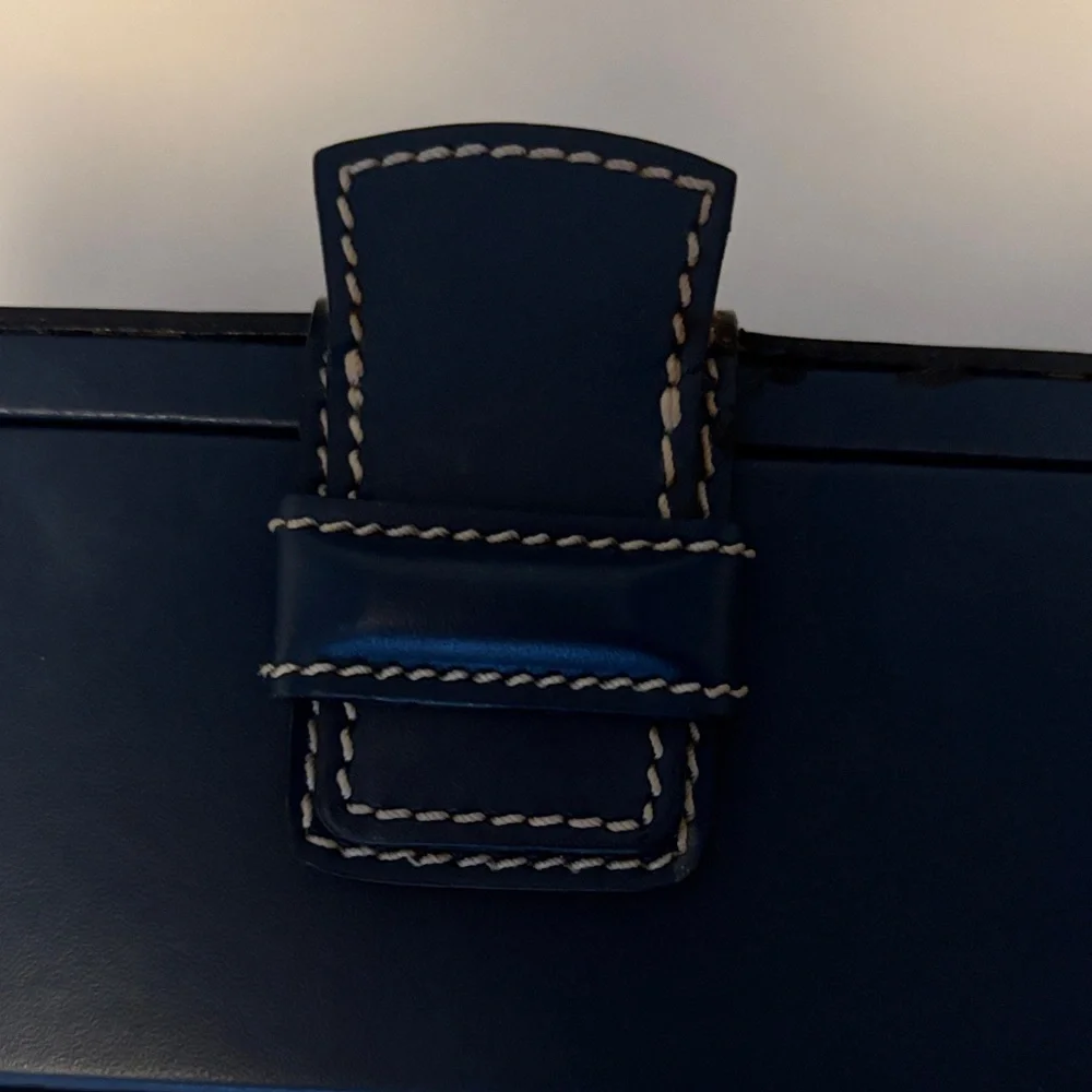 Dooney & Bourke Black and Navy Clutch